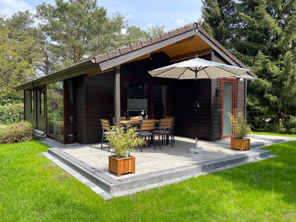 Op de foto is het object Ferienhaus-Waldsiedlung Dankern te zien, gelegen in de stad Geest.
