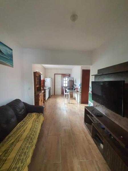A la foto es mostra l'objecte Casa aconchegante situat a la ciutat de Garopaba.