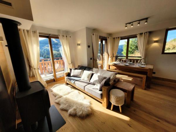 A la foto es mostra l'objecte Résidence Le Kilimandjaro - Appartement lumineux avec vue sur le domaine des Chavannes MAE-1081 situat a la ciutat de Les Gets.