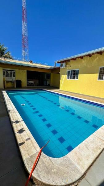 The photo shows the Casa Residencial recebe você e sua Família! located in the city of Cuiabá.