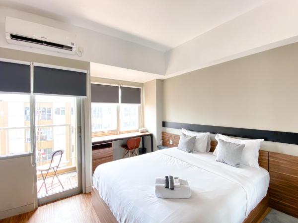 Nella foto è visibile l'oggetto Homey and Simply Look Studio Gateway Park LRT City Jatibening Apartment By Travelio situato nella città di Pangkalanuringin.