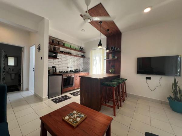 The photo shows the One bedroom with private garden located in the city of Dambani.