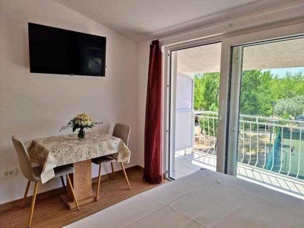 A la foto es mostra l'objecte Apartment Matea situat a la ciutat de Duće.