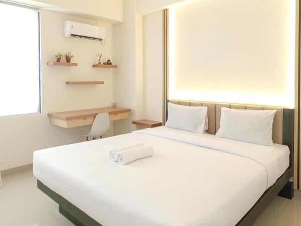 Auf dem Foto ist das Objekt Cozy Stay Studio Room at Altuz Seturan Yogyakarta Apartment By Travelio in der Stadt Seturan zu sehen.