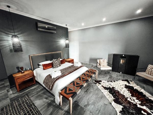 A la foto es mostra l'objecte 4 Aces Outfitters Lodge situat a la ciutat de Kimberley.
