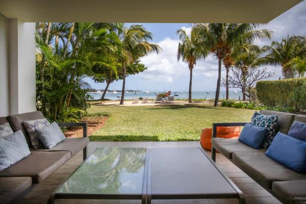 Appartement 3 chambres pied dans l'eau avec plage et grande piscine, Ривьер-Нуар