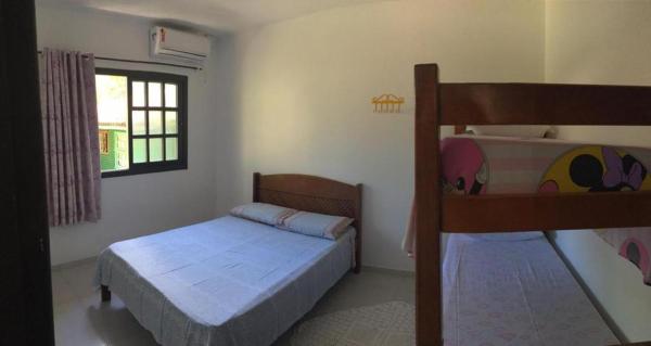 A la foto es mostra l'objecte Casa a poucos metros do mar na Praia da Ferrugem-sc situat a la ciutat de Garopaba.