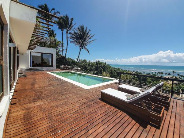 照片显示了位于Arraial d'Ajuda市的Casa Blanca - Vista espetacular no coração do Arraial d'Ajuda物件。