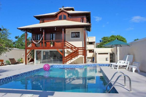 På billedet ses objektet Campeche casa pé na praia a 150 mt praia beliggende i byen Florianópolis.