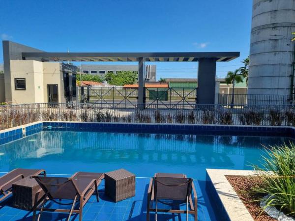 Na zdjęciu widoczny jest obiekt 1204 Apto 2 Quartos Cabedelo Ponta de Campina Cabedelo TAXA DE ENERGIA E LIMPEZA SÃO COBRADAS NO CHECK-IN E CHECK-OUT położony w mieście Cabedelo.