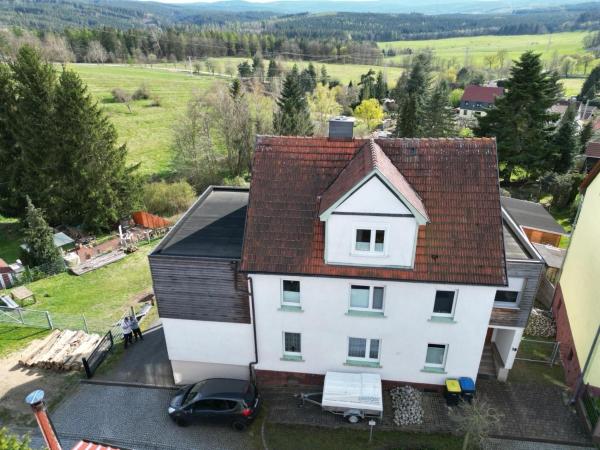 На фото показан объект Ferienwohnung im Thüringer Wald, расположенный в городе Altenbergen.