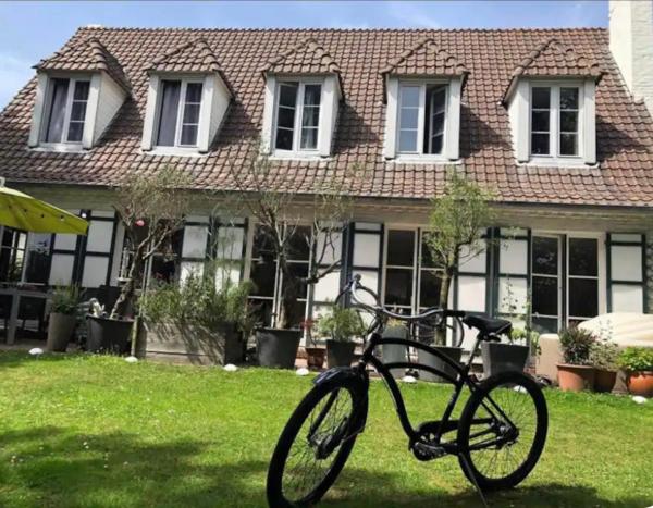 A la foto es mostra l'objecte Maison 7 Pers 15 mn de Lille situat a la ciutat de Santes.
