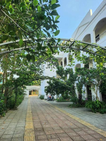 A la foto es mostra l'objecte Đinh Gia Palace situat a la ciutat de Nam Giao.