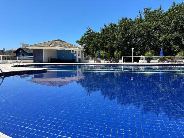 På billedet ses objektet Apartamento completo Cezarium Residence Club - Praia do Campeche beliggende i byen Florianópolis.