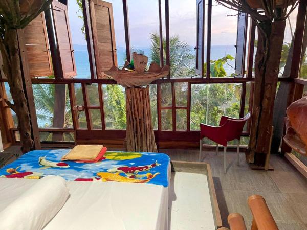 The photo shows the Karang Aji Beach Villa located in the city of Wangun.