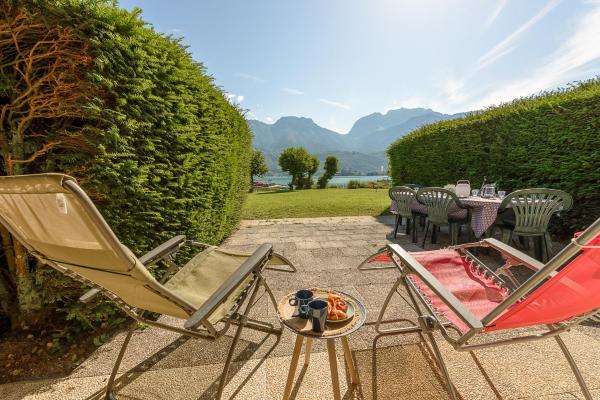 A la foto es mostra l'objecte Lake and Chill - rez de jardin de 3ch, pieds dans l'eau situat a la ciutat de Duingt.
