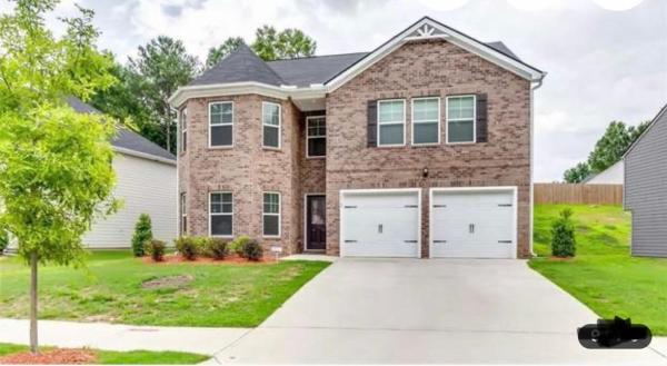 写真にはEllenwood市にあるExquisite 5 Bedroom Near Airportが写っています。