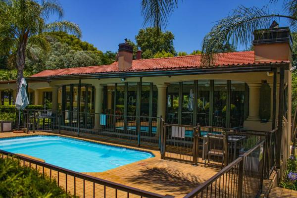 Na foto é possível ver o objeto Hutten Heights Lodge by Ilawu localizado na cidade de Hutton Heights.