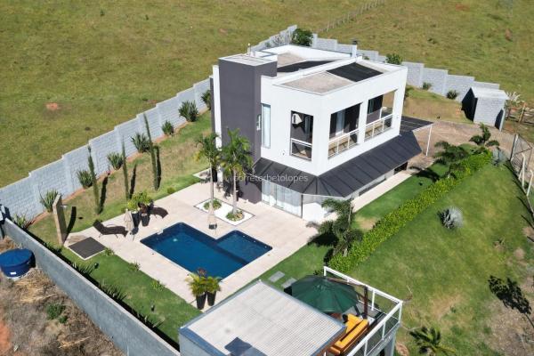 A la foto es mostra l'objecte Chácara JL Alto Padrão com Piscina Área de Lazer e Quadra de Areia situat a la ciutat de Borda da Mata.