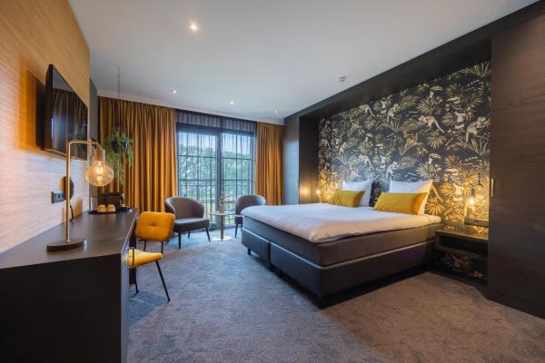 Auf dem Foto ist das Objekt Van Der Valk Hotel Brugge Oostkamp in der Stadt Oostkamp zu sehen.