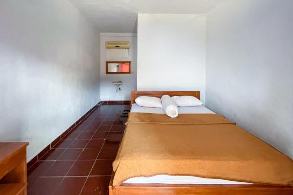 A la foto es mostra l'objecte Guest House Surya Ayu Permai Buleleng Mitra RedDoorz situat a la ciutat de Panji.