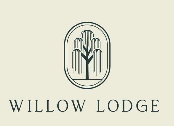 The photo shows the Willow Lodge in the Valley located in the city of Snake Valley.