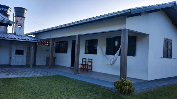 A la foto es mostra l'objecte Casa completa na praia da Ferrugem SC situat a la ciutat de Garopaba.