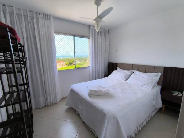 A la foto es mostra l'objecte Apto Inteiro - Com roupa de cama e banho - Elevador - Garagem - Wi-fi - Vista Mar de todas as janelas e varanda situat a la ciutat de Guarapari.