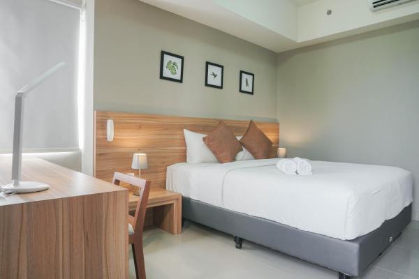 A la foto es mostra l'objecte Minimalist and Cozy Stay 1BR Apartment at Mustika Golf Residence By Travelio situat a la ciutat de Cikarang.