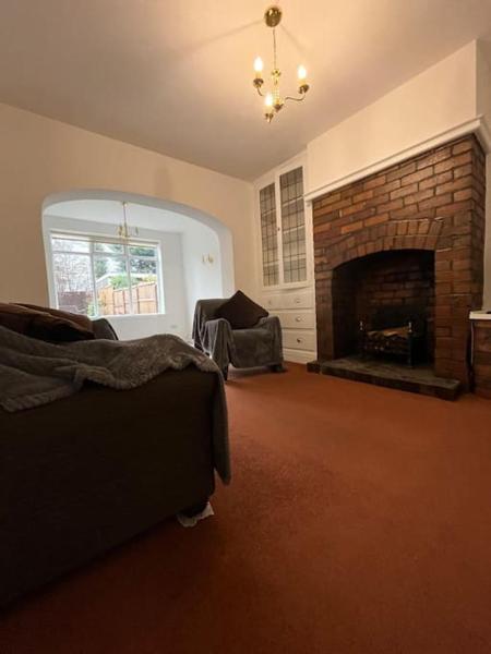 A la foto es mostra l'objecte West Street House-Furnished Let situat a la ciutat de Elsecar.