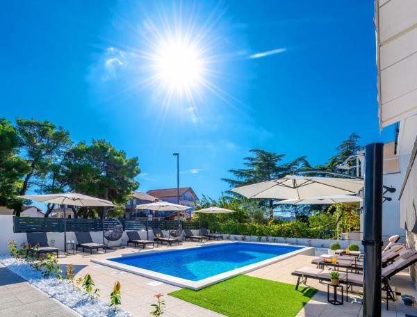 A la foto es mostra l'objecte Apartments Sunny Sky situat a la ciutat de Vodice.