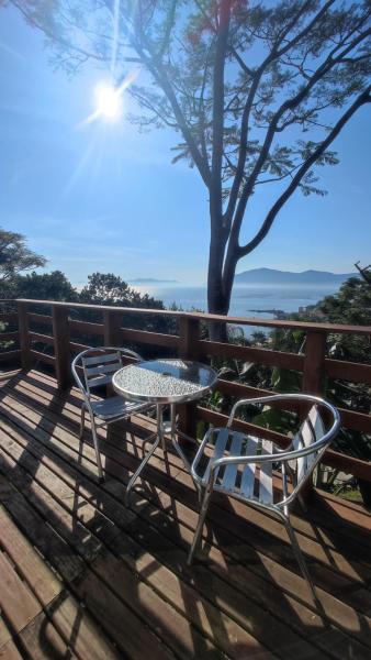 A la foto es mostra l'objecte GREEN HOUSE - com linda vista para o mar situat a la ciutat de Palhoça.