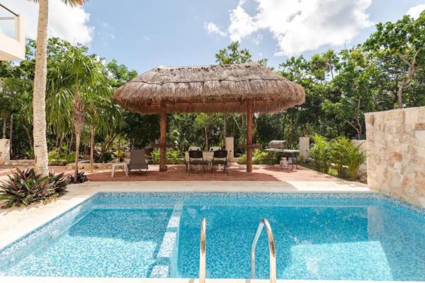Na zdjęciu widoczny jest obiekt Departamento 2, Tulum Country Home, con Muelle de Pesca, Club de Playa, Alberca, Cenote y Campo de Golf, Contrata Day Pass Bahia Principe położony w mieście Tulum.