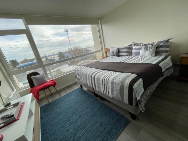 Na fotografii je vidět objekt SleepWell Estudio King con sofá cama nacházející se ve městě Temuco.