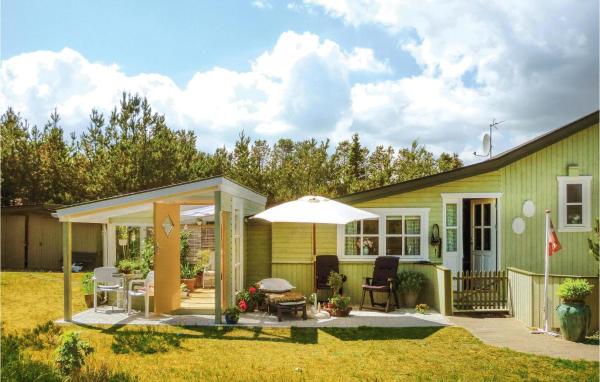 På billedet ses objektet Three-Bedroom Holiday Home In Saby beliggende i byen Sæby.