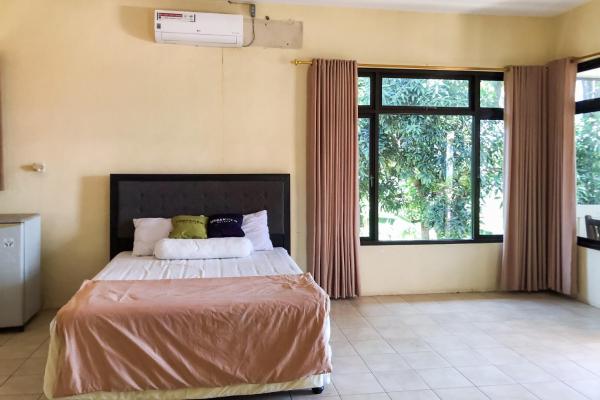 写真にはPasauran市にあるUrbanview Umbul Tanjung Resort Anyerが写っています。