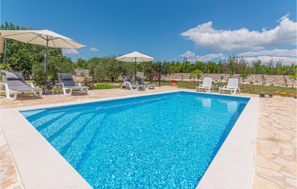 A la foto es mostra l'objecte Three-Bedroom Holiday Home In Vinovo Donje situat a la ciutat de Čvrljevo.