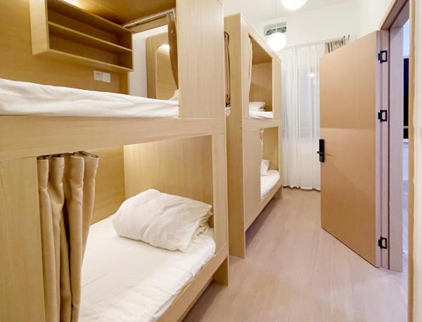 På bildet vises objektet Jingdezhen Shower&bed Youth Hostel som ligger i byen Xianghu.