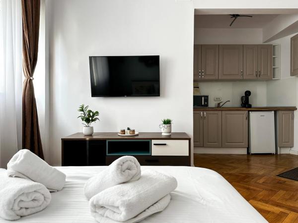 A la foto es mostra l'objecte Carol in WoodLand Central Studio situat a la ciutat de Bucarest.