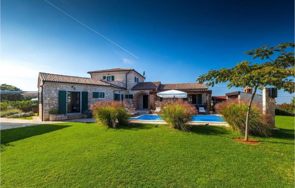 A la foto es mostra l'objecte Villa Una situat a la ciutat de Baldaši.