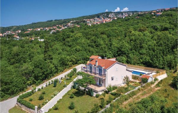 The photo shows the Cozy Home In Glavina Donja With Kitchen located in the city of Donja Glavina.