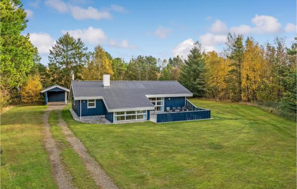 Na fotografii je vidět objekt Holiday Home Revlen Jerup Xi nacházející se ve městě Jerup.