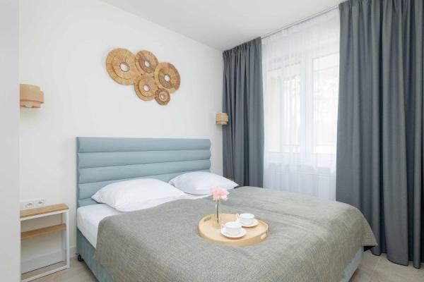 En la foto se muestra el objeto Przytulny Apartament z Parkingiem & Balkonem Blisko Morza by Noclegi Renters ubicado en la ciudad de Dąbki.