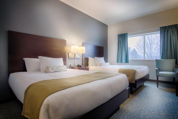 Pokoj Deluxe se 2 manželskými postelemi Queen — 26 m² - Sun & Ski Inn and Suites