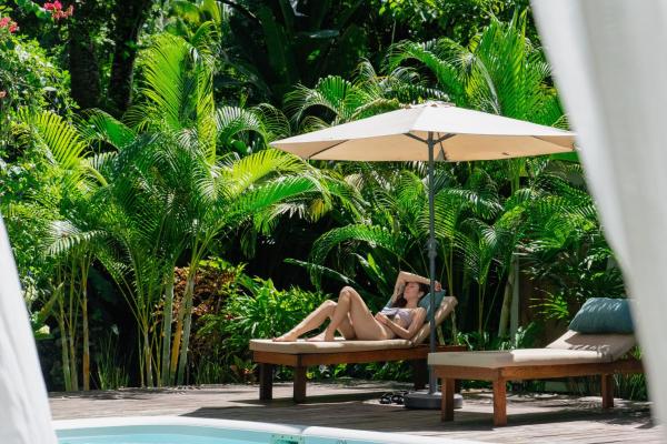 The photo shows the Dragonfly Beachfront Villas-Adult Only located in the city of Punta Uva.