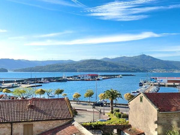 A la foto es mostra l'objecte El piso de Carmen situat a la ciutat de Portosín.