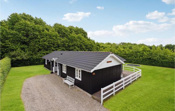 Na fotografii je vidět objekt Holiday Home Østmarken Toftlund Iv nacházející se ve městě Arrild.