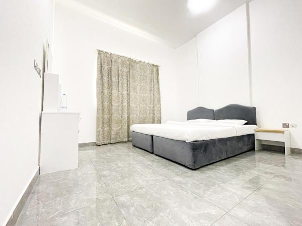 Na fotografii je vidět objekt Warsan Star Residence - Home Stay nacházející se ve městě Dubaj.