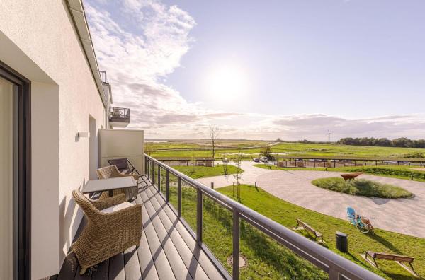 Na fotografii je vidět objekt Ferienwohnung Ostseeblick mit Balkon nacházející se ve městě Wustrow.