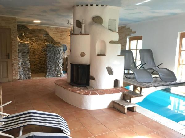A la foto es mostra l'objecte Wellnessalmhaus situat a la ciutat de Kloster.